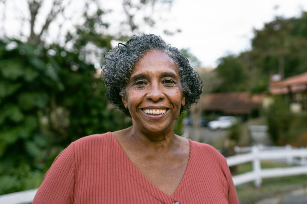 Portrait of a senior woman in the country house.